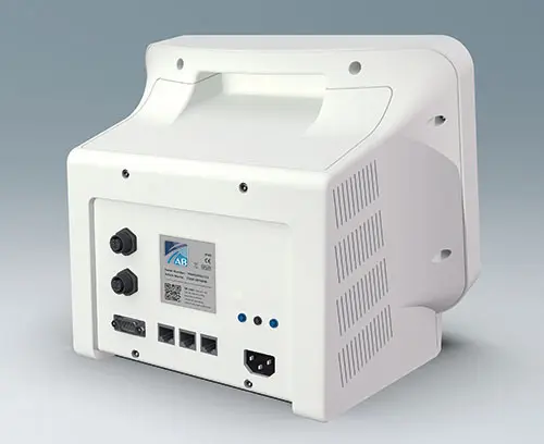 Protected installation of interfaces and supply cables on the rear of the housing